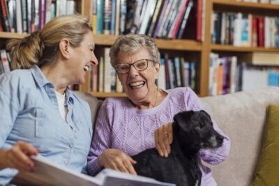 Senior with her daughter and dog